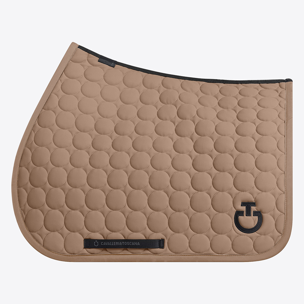 Light brown jumping saddle pad with circular quilting and black logo for horse and pony Circle Quilted - Cavalleria Toscana